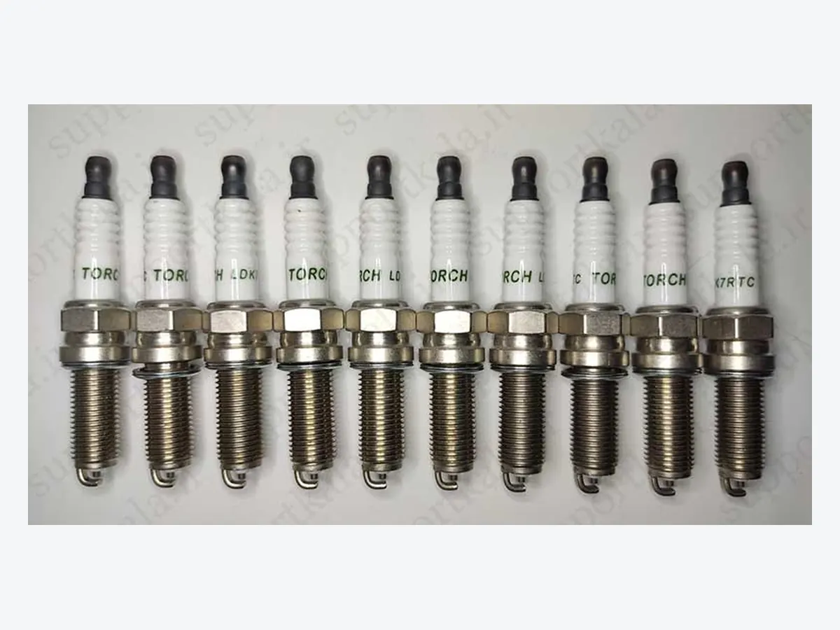 نمای شمع خارج شده از جعبه شمع خودرو اصل TORCH کد DK7RTC